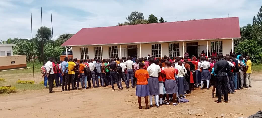 School community assembly at Lwebitakuli Seed Secondary School